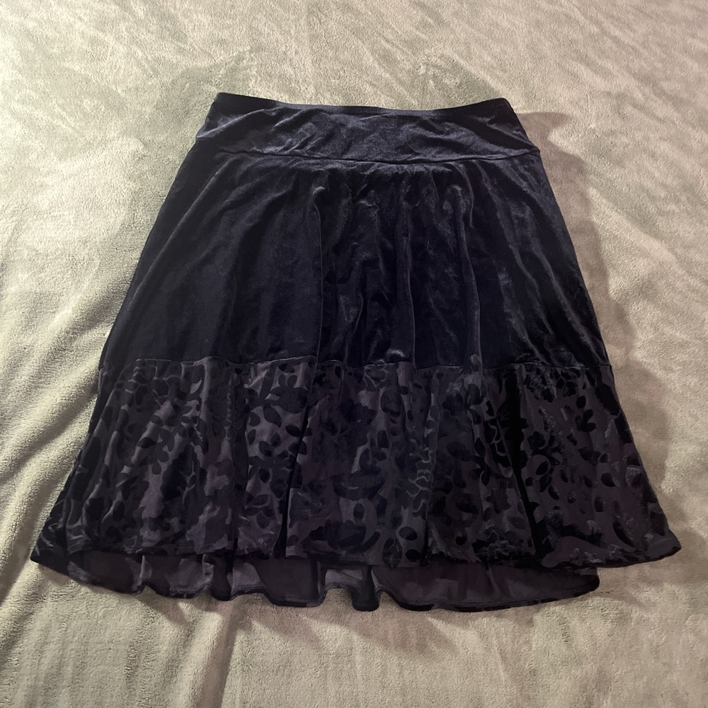 Black velvet skirt with floral detailing